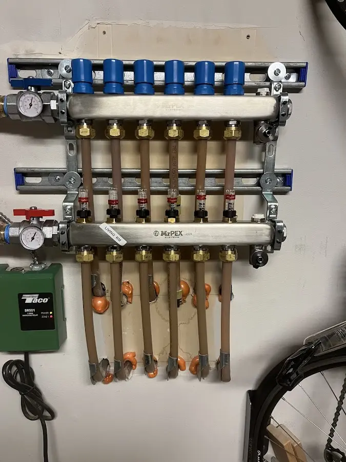 Plumber performing Gas Line Installation at a residential property in Coopersville